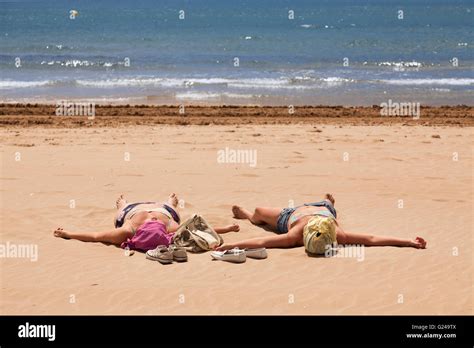 sunbathing girls|40,021 Beautiful Girl Sunbathing Beach Stock Photos